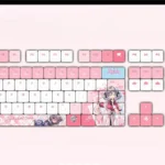 Close-up views of the exclusive Jigokudani Sara PBT backlit keycap set, showcasing its vibrant anime girlfriend art and smooth PBT texture from various angles.