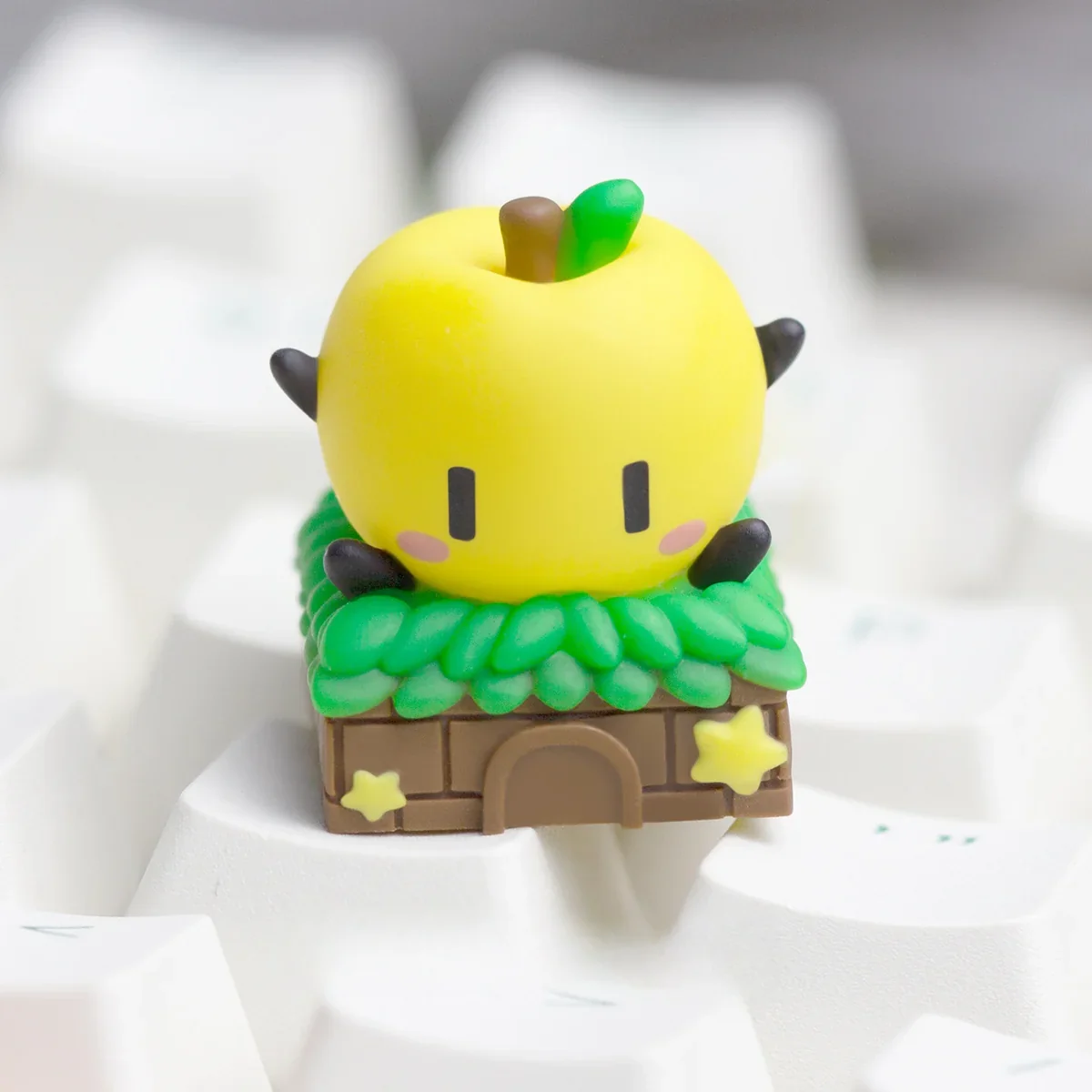 A vivid handcrafted Stardew Valley Junimo ESC keycap, featuring its whimsical pixel-art design in detailed resin, shown from a unique playful angle.
