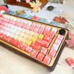 Exquisite Autumn Maple PBT keycaps set, featuring vibrant red and autumnal art from various angles, optimized for backlight glow.