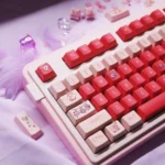 Playful Kirby PBT dye-sub keycaps set showcase vibrant character art from multiple angles, emphasizing the premium material and charming, pastel-infused design.