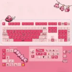 Vibrant Kirby PBT dye-sub keycap set showcasing playful side-lit legends, bringing charming character art to your keyboard with premium quality.