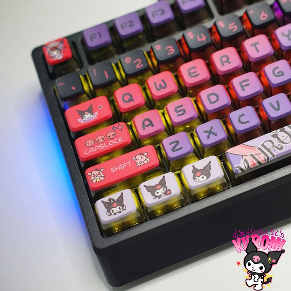 A collection of Kuromi RGB pudding keycaps set displayed from multiple angles, highlighting the iconic mischievous Kuromi art and vibrant translucent RGB glow.