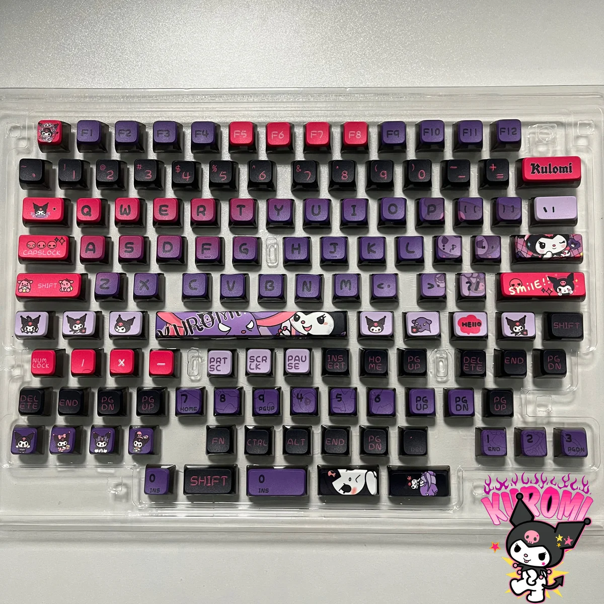 Mischievous Kuromi RGB pudding keycaps set featuring iconic characters in vibrant purple hues, illuminating with a dazzling translucent glow.