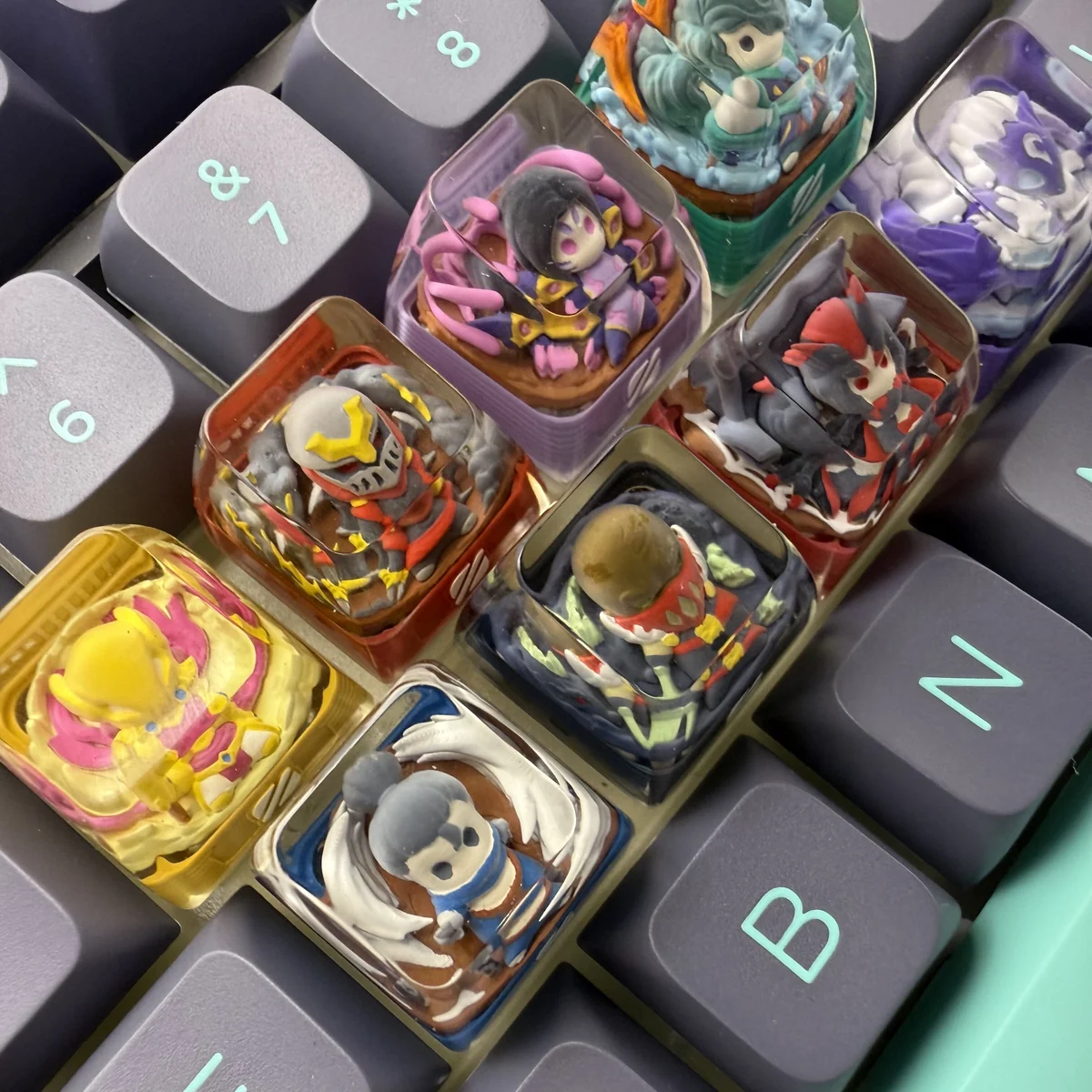 Artisan Yasuo LoL keycap gallery, displaying handcrafted resin details, vibrant backlit effect, and ergonomic SA profile from multiple views.