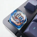 Close-up views of the handcrafted Yasuo LoL keycap, highlighting its intricate resin design, translucent SA profile, and vibrant backlit potential.