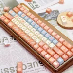 Charming Maillard Bear PBT dye-sub keycaps set from various angles, showing warm caramel and brown tones with cute bear illustrations.