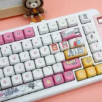 Various angles of Labubu Mischievous PBT Keycaps Set. Highlights playful elf-like designs, durable PBT construction, and vibrant RGB backlit glow for customization.