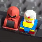 A collection of detailed views showcasing the handcrafted Chibi Character resin keycap, highlighting its vibrant, stylized mecha art from multiple angles.