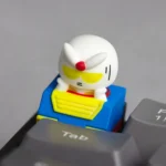 A gallery of handcrafted Chibi Character resin keycaps, showcasing vibrant, stylized mecha art and intricate details from various angles.