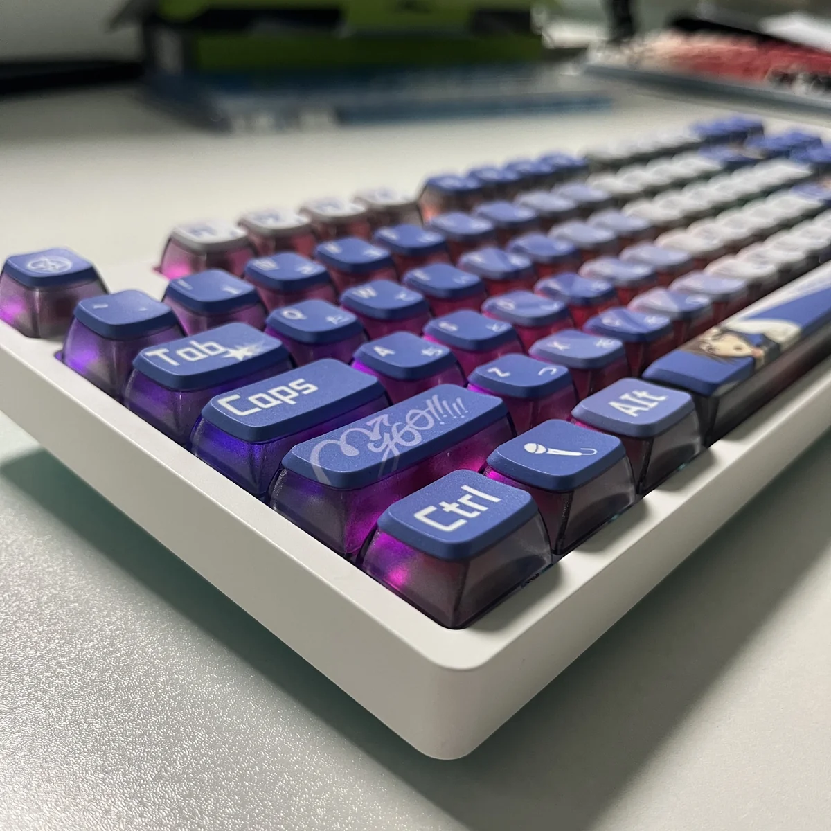 Artistic gallery views of the MyGO Tomori translucent PBT keycaps set, showcasing vibrant four-sided anime luminescence and melancholic artistry.