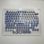 MyGO Tomori translucent PBT keycaps set, anime-themed. Various angles showcase four-sided luminescence, melancholic artistry, and radiant RGB.