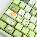 Exclusive Genshin Impact Nahida MDA Profile Keycap Set from various angles, featuring vibrant character art and Nahida's iconic whimsical colors.