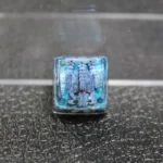 Close-up views of the handcrafted Naruto Isobu Tailed Beast resin keycap, highlighting its ethereal aquatic design and vibrant sky-blue artistry design.