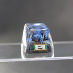Handcrafted Naruto Matatabi artisan keycap featuring a fiery mythical feline with glowing blue flames, intricately sculpted in resin.