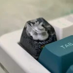 Detailed gallery views of the exquisite handcrafted Naruto Six-Tails Saiken artisan keycap, highlighting its vibrant sculptural form and fierce spirit.