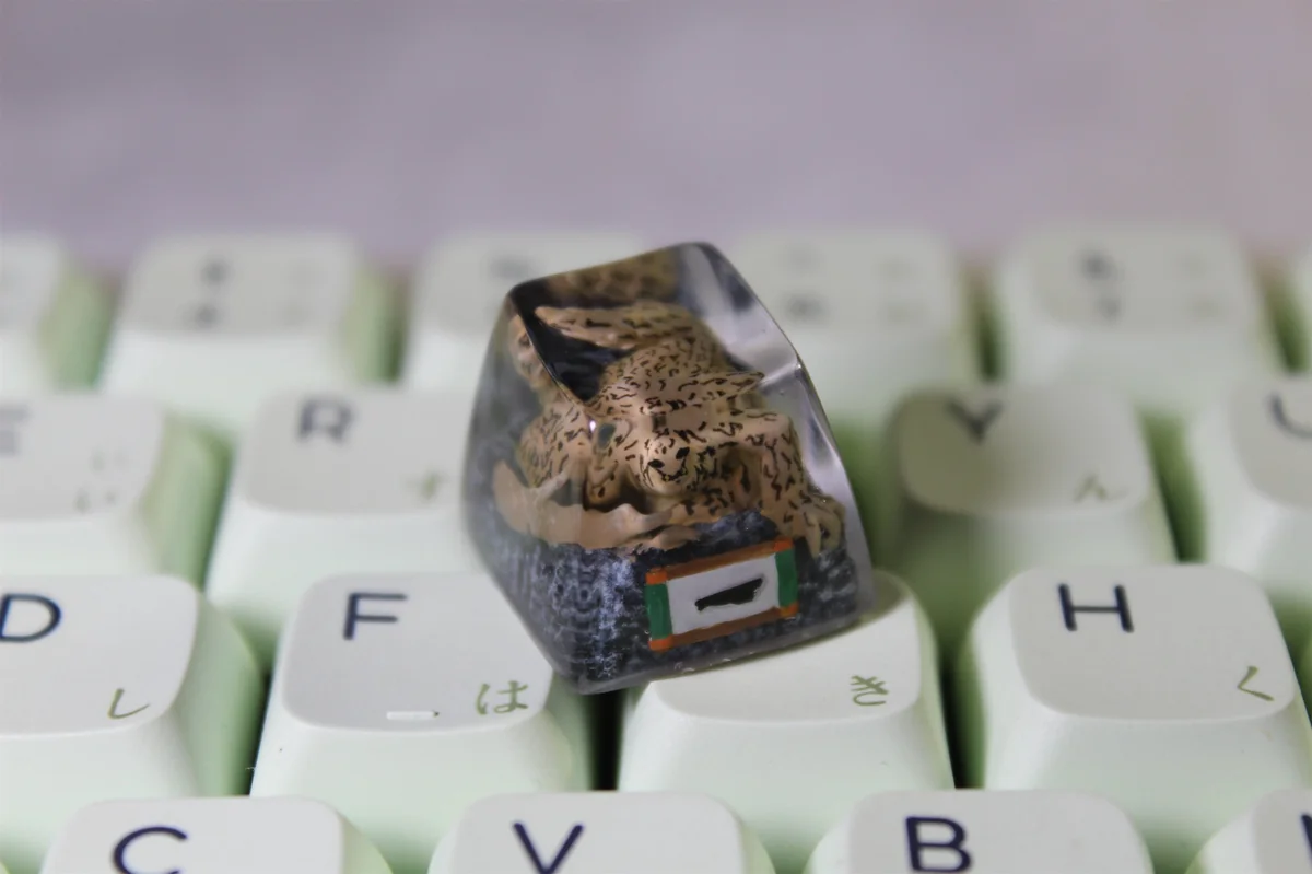 Premium Naruto Shukaku artisan keycap, showcasing its intricate handcrafted white resin sculpture from various angles, inspired by the anime.