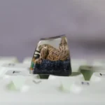 Premium handcrafted Naruto Shukaku artisan keycap in intricate white resin, showcasing detailed anime-inspired craftsmanship from various angles.