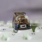 Close-up of a premium handcrafted white resin Naruto Shukaku artisan keycap, intricately sculpted with anime-inspired detail.