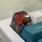 Handcrafted Naruto Four-Tails resin keycap, shown from various angles. Features vibrant red, powerful beast, and intricate anime details.