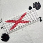 Artistic Objection Overruled keycaps set in a striking white and red two-tone design, featuring minimalist side-engraved legends and Cherry profile.