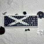 A striking black and white 73-key set of Objection Overruled keycaps set featuring bold, minimalist side-engraved Cherry legends.