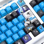 Exclusive Overwatch Ana keycap set: Vigilant Spirit design. Various angles reveal intricate character details and premium color palette.