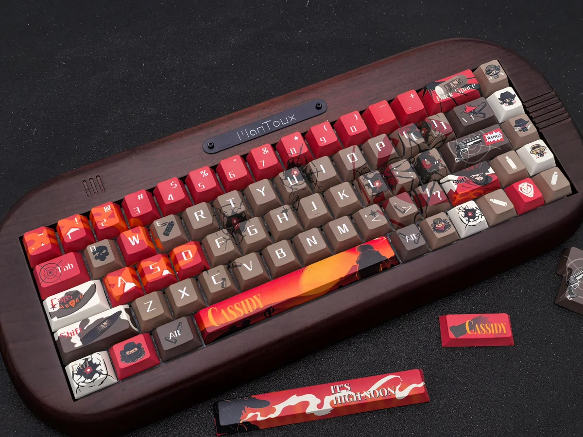 Handcrafted Overwatch Cassidy keycap set displaying intricate character details and a rugged Western aesthetic, a premium artisan collectible.