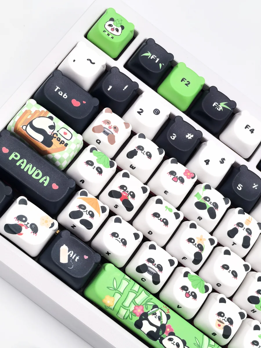 Exquisite handcrafted panda artisan keycap set showcasing its whimsical miniature sculpture and meticulous artistry from different perspectives.