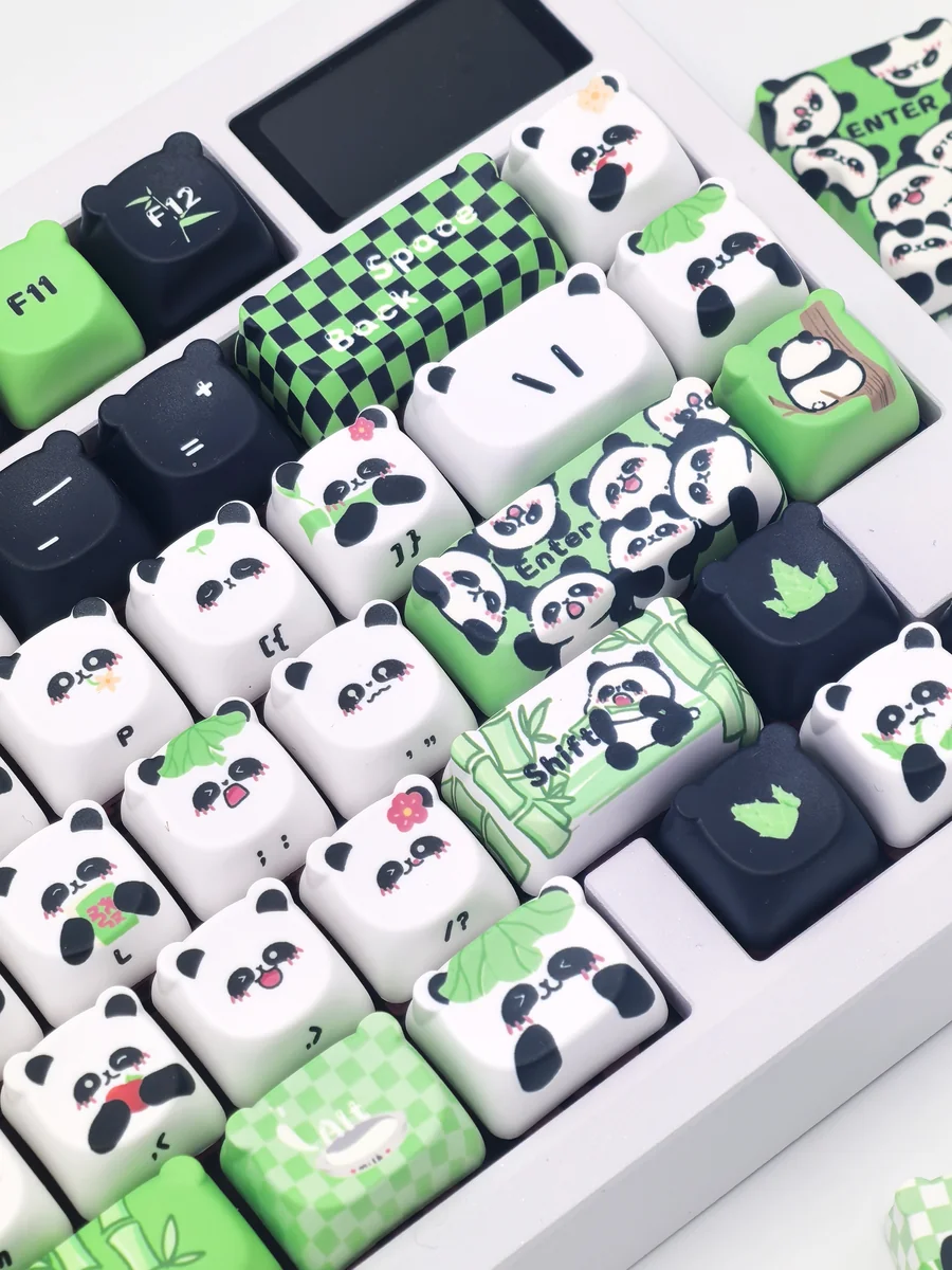 Exquisite handcrafted panda artisan keycap set. Whimsical miniature panda sculpture, meticulously crafted, showcasing its iconic black and white charm design.