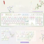 Artistic Wind Chime Dream PBT keycap set, blue-pink gradient, featuring front-lit legends and whimsical motifs in a durable, small full set.