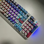 Playful gallery shot of vibrant RGB PBT MyGO Band Theme keycap set featuring a comfortable MDA profile, showcasing their immersive translucent glow from all angles.