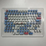 Close-up views of vibrant RGB PBT MyGO Band Theme keycap set, highlighting their comfortable MDA profile and playful translucent design with immersive RGB backlighting design.