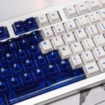 Luminous Acid Blue White PC keycaps set from various angles, showcasing the vibrant translucent blue and clean opaque white contrast, ideal for a modern angles.