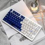 Luminous Acid Blue White PC keycaps set variant, featuring two distinct sets: one with opaque ceramic white and translucent acid blue, another fully translucent design.