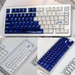 Striking Luminous Acid Blue White PC keycaps set, featuring translucent blue and opaque white for a vibrant, modern, illuminated setup.