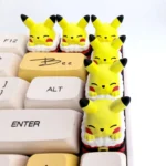 Vibrant handcrafted 3D resin Pikachu keycap, sculpted with festive details, bringing playful charm to any mechanical keyboard.