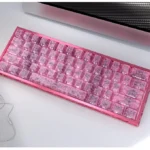 Multiple angles of premium Pink Forged Carbon Keycaps Set, highlighting their distinctive high-tech texture and vibrant, playful pink elegance.