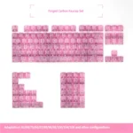 Premium pink forged carbon PC keycaps set, a small full set with side-engraved legends, highlighting their distinctive texture and playful elegance.