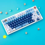 Playful gallery of durable PBT Pirate Keycaps Set, showcasing their blue and white nautical design from various angles.
