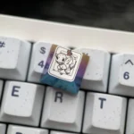 Premium Charmander Titanium Pokemon artisan keycap, showcasing its iconic design and metallic finish from various detailed angles.