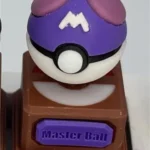 A vibrant 3D Pokemon Poke Ball keycap, showcasing its iconic sculpted design and premium finish from multiple playful angles. Relive childhood nostalgic design.