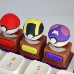 A vibrant 3D Pokemon Poke Ball keycap, featuring its iconic sculpted design. Relive childhood with this premium keyboard accessory.