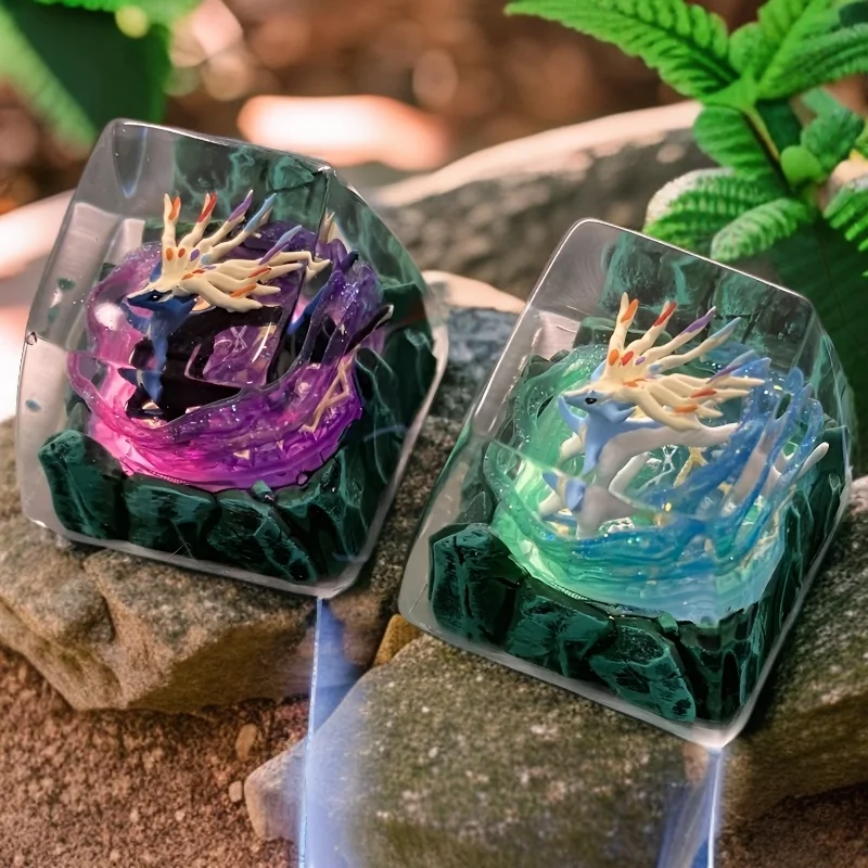 Exquisite handcrafted legendary Pokemon artisan keycap featuring intricate sculpture, vibrant colors, and translucent resin.