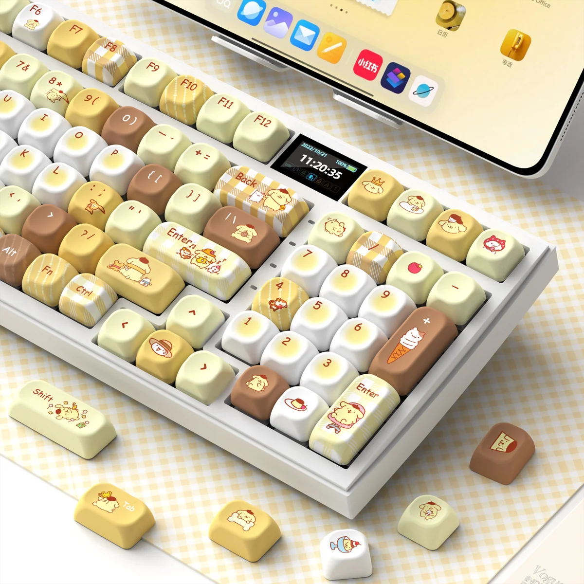 Adorable Pompompurin PBT keycap set displayed from various angles, showcasing cheerful yellow and brown character designs and durable quality.