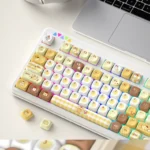 Adorable Pompompurin PBT keycap set featuring the cheerful pudding dog character in warm yellow and brown, showcasing its durable quality.