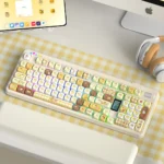 Adorable Pompompurin PBT keycap set featuring cheerful yellow and brown designs, showcasing durable PBT quality for your keyboard.