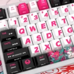 Close-up view of the Racing Miku PBT keycaps set, highlighting their luminous side-engraved legends and dynamic anime racing aesthetic.