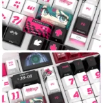 Racing Miku side-lit PBT keycaps set, showcasing the luminous side-engraved legends on a small full set, perfect for a dynamic anime racing aesthetic.