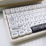 Delightful Radish Rabbit MOA PBT keycaps set from varied angles, showcasing their whimsical pastel design and uniform spherical profile.