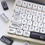 A gallery view of the delightful Radish Rabbit MOA PBT Keycap Set, highlighting charming pastel motifs and its uniform spherical MOA profile.